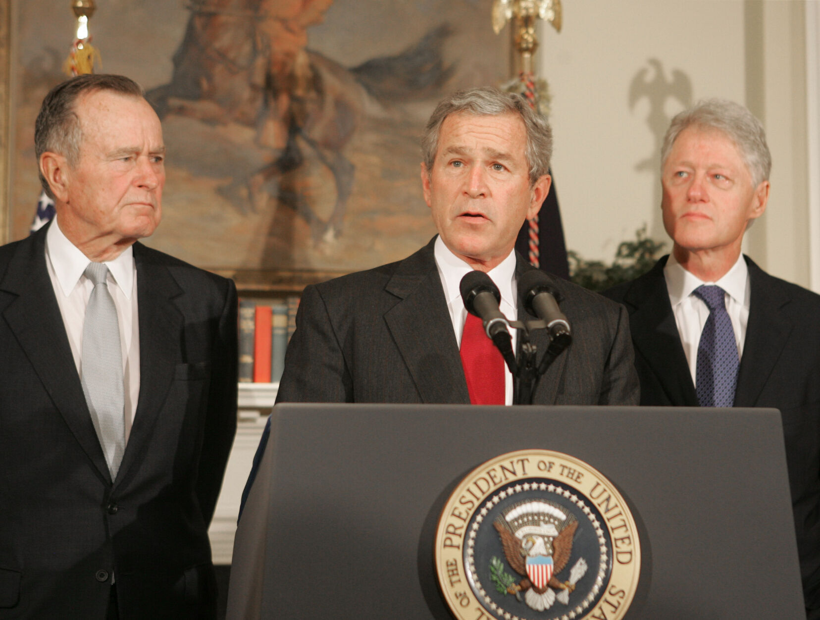 2005: Tapped by President Bush to raise money for tsunami-battered regions